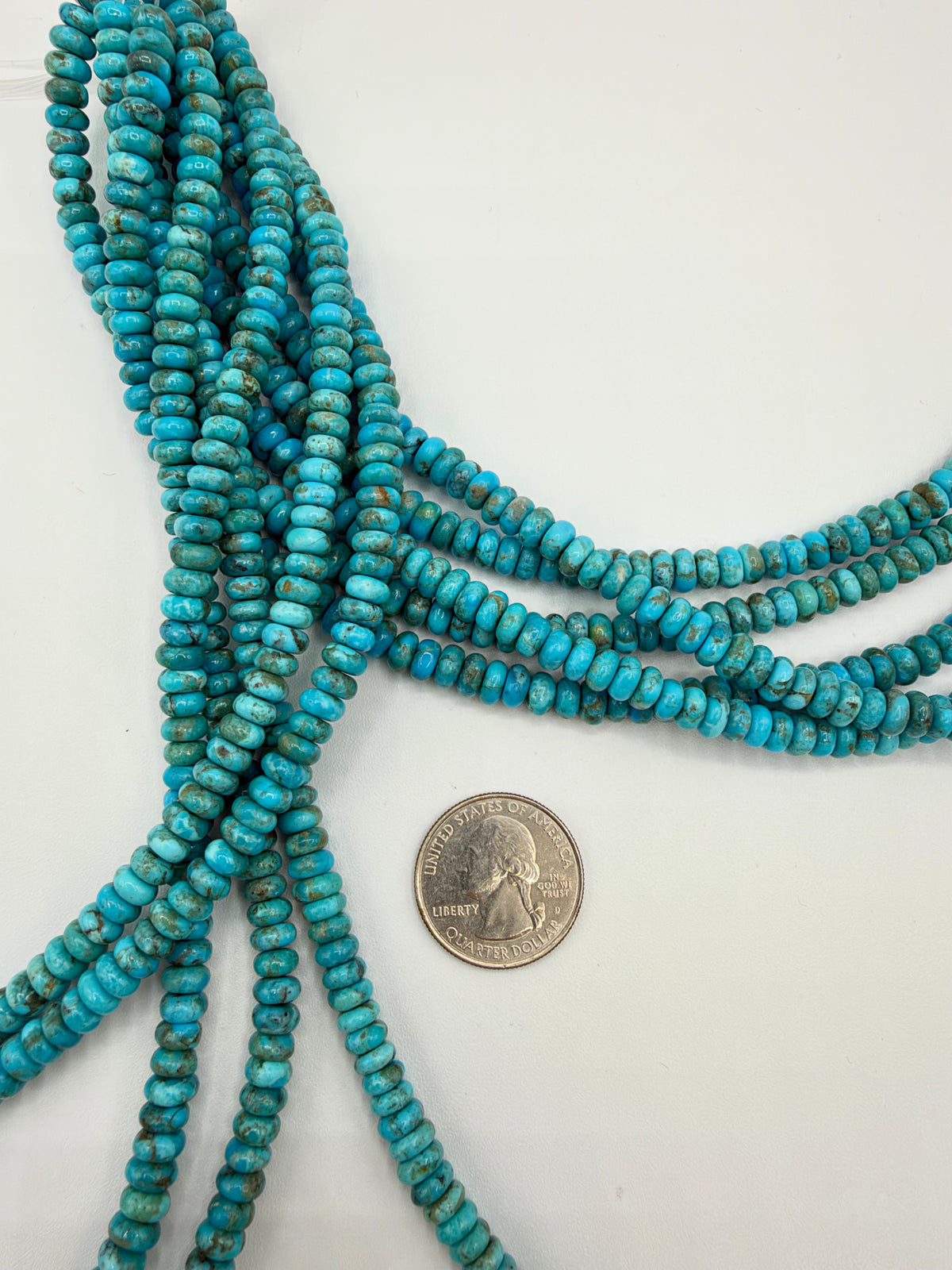 Kingman Turquoise 6-7mm Rondell Beads - Sold by 8" Strand