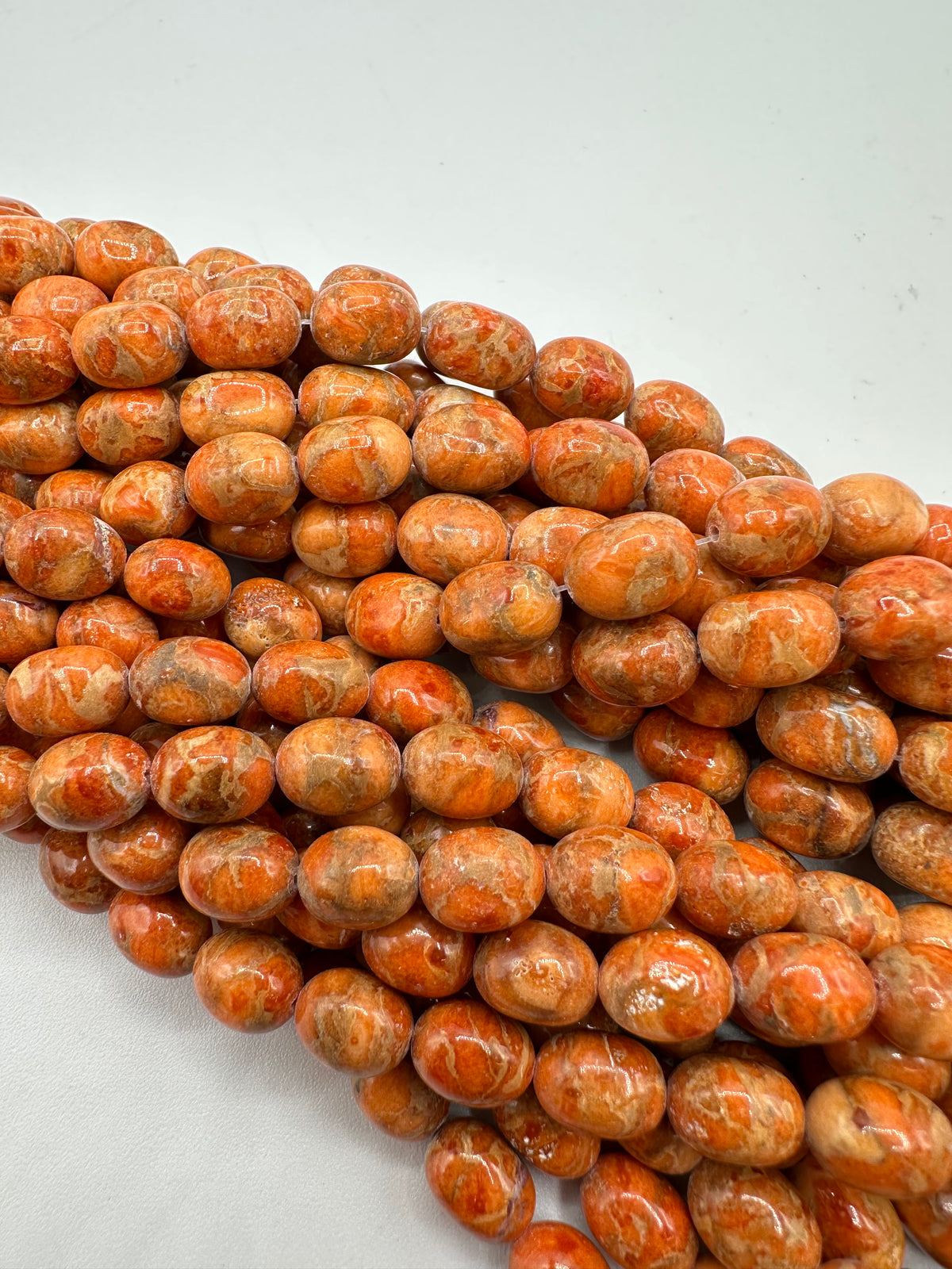 Apple Coral Potato Beads - Approx. 8x10mm - Sold by 8" Strand